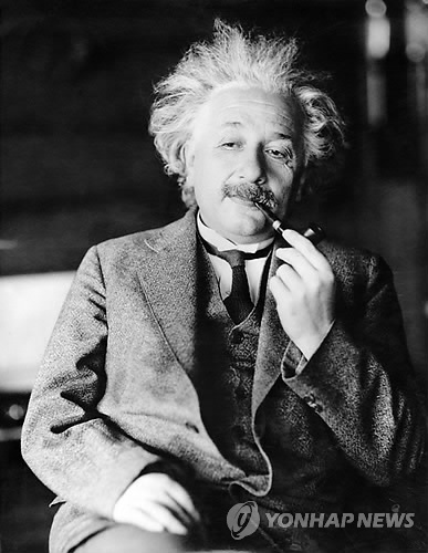This undated file photo shows famed physicist Albert Einstein. Scientists at the European Organization for Nuclear Research, or CERN, the world's largest physics lab, say they have clocked subatomic particles, called neutrinos, traveling faster than light